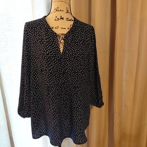 Women's black top with white polka dots.⚫️⚪️